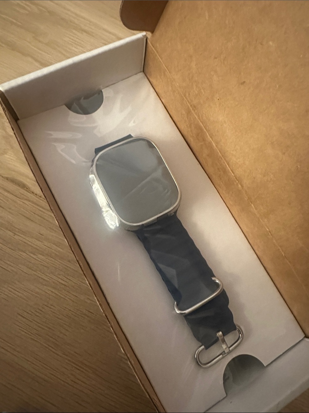 Apple Watch Ultra GPS cellular 49 MM titanium case with blue ocean band one size